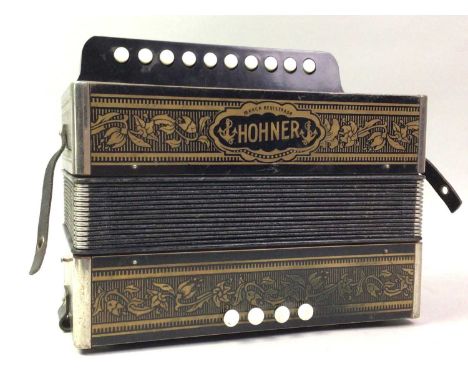 HOHNER  CONCERTINA       ACCORDION, black and gilt28cm wide