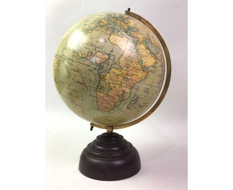 TERRESTRIAL GLOBE, 20TH CENTURY by Geographia, on circular base36cm high23cm diameter.