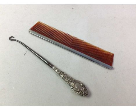 ART NOUVEAU SILVER  BACKED DRESSING TABLE SET comprising hand mirror, two hairbrushes, a button hook and a comb