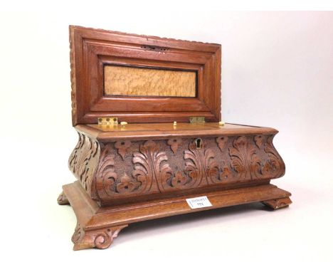 VICTORIAN CARVED TEA CADDY, fitted with three lidded compartments with bone handles39cm x 24cm