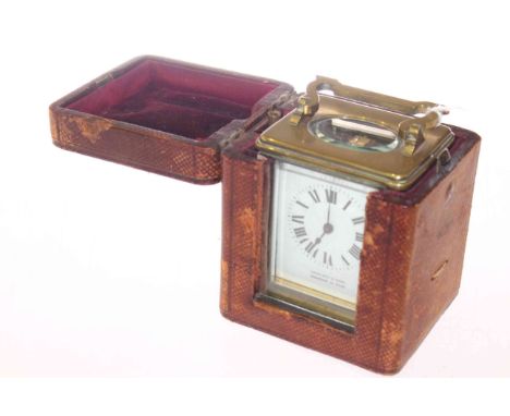 Gilt brass carriage clock with travel case