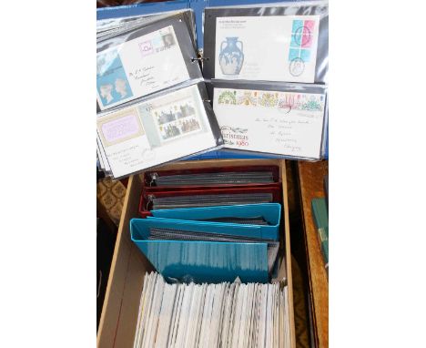 Large collection of GB first day covers in five albums and loose