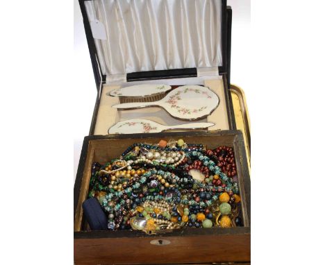 Two enamel backed cased dressing table sets and box of costume jewellery