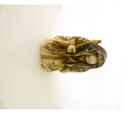 CARVED ORIENTAL LADY NETSUKE