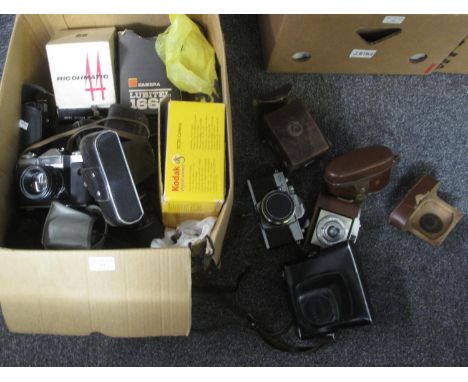 Box of cameras and accessories to include; Kodak DC20 digital camera in box, Kodak Brownie cameras, Zenit-E, Le Clic, Kodak A