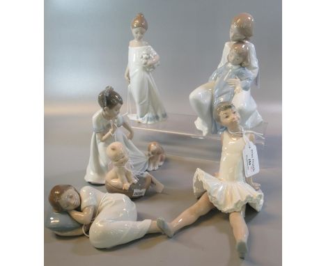 Five Nao Spanish porcelain figurines/figure groups of young girls, a seated ballerina, puppy etc. Together with a Nao Collect