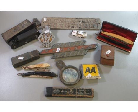 Box of assorted items, to include: British Railways cast metal sign, two vintage AA badges, Fordson Power Major tractor badge