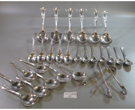 Plastic tub of silver and silver plated flatware to include; six silver teaspoons, silver sugar tongs and silver plated dinne