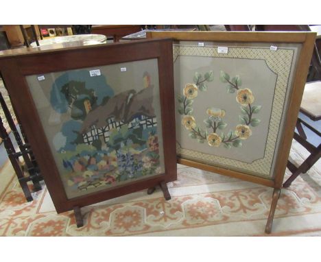 Two early 20th century framed tapestry fire screens with cottage and floral designs.  (2)  (B.P. 21% + VAT) 