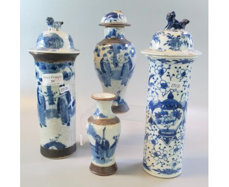 A group of Chinese blue and white porcelain vases, to include: a pair of sleeve/cylinder vases and two baluster shaped vases 