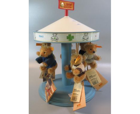 Steiff display carrousel together with six  Stieff miniature bears.  (B.P. 21% + VAT) 