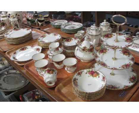 Four trays of Royal Albert English fine bone china 'Old Country Roses' design tea and dinnerware items to include: cake stand