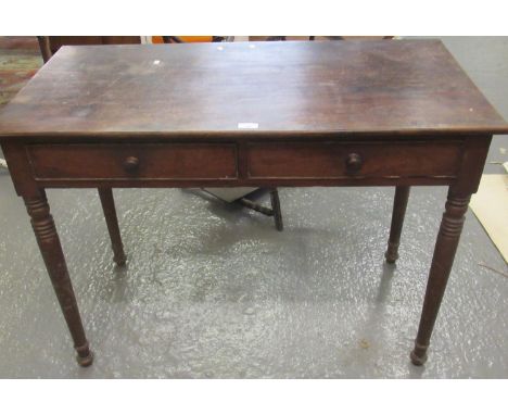 19th century mahogany two drawer side table on ring turned baluster tapering legs. (B.P. 21% + VAT) Tired condition.  Fading 