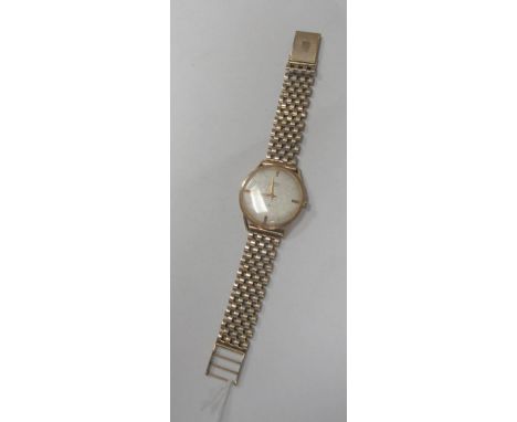 Uno; A Vintage Gent's Wristwatch, the signed circular dial with line markers and subsidiary seconds, within slim case, stampe