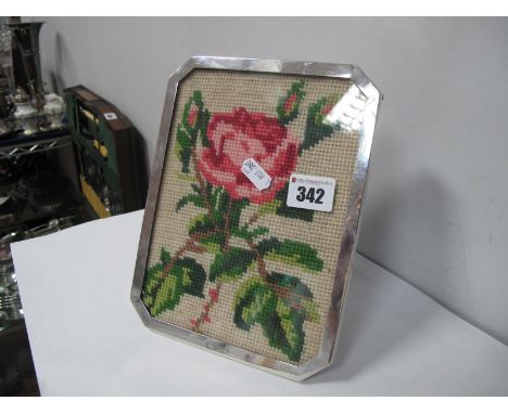 A Hallmarked Silver Mounted Picture Frame, of rectangular form with canted corners, on wooden easel back, 21.3 hgh.