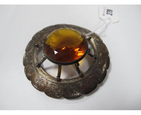 A Large Celtic Style Brooch, circular collet set to the centre within leaf scroll engraved frame, stamped "ACF", overall diam