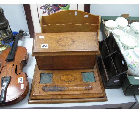 An Edwardian Oak Desk Tidy, fitted with slope front correspondence box, boxwood stringing and fan oval, lacking inkwell, and 