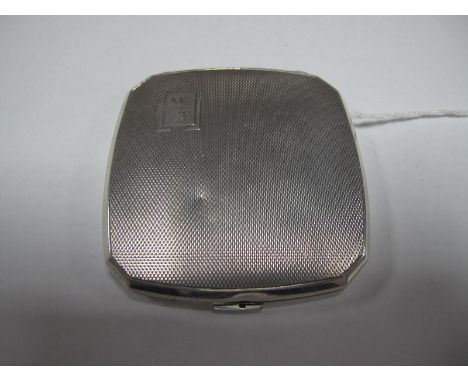 A Hallmarked Silver Powder Compact, allover engine turned, initialled.