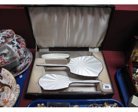 A White Enamel Backed Three Piece Silver Dressing Table Set.