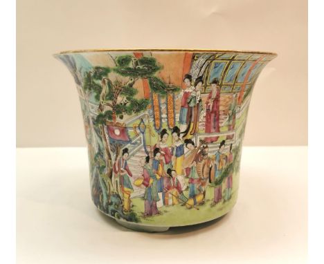 A 19th century Famille Rose hand painted porcelain flared rim planter with mountain village and courtroom scene design. Ungla
