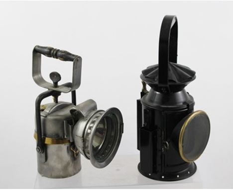 A "CRESTELLA" - "PREMIER LAMP", made in Leeds, 27cm high, together with a black painted "Eastgate & Son Ltd." of Birmingham L