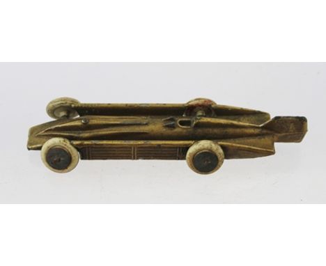 AN EARLY 20TH CENTURY DIE-CAST MODEL OF THE "GOLDEN ARROW", the 1929 World Speed Record vehicle, recording 231m.p.h. at Dayto