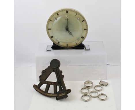 A MISCELLANY OF ITEMS, includes an Art Deco electric Mantel Clock, a Sextant, six assorted silver Napkin Rings and a plain si