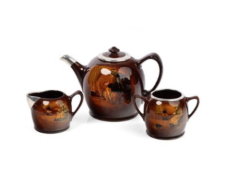Royal Doulton Kingsware tea set, 'At Eventide' to include a teapot, sugar bowl and a cream jug, each with a silver rim / moun