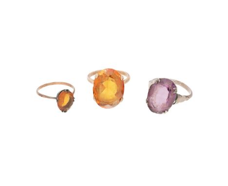 A 9ct gold and citrine dress ring, the large oval citrine of approximately 19.8 by 14.9mm, size R/Q, 7.5g, a silver and 9ct g