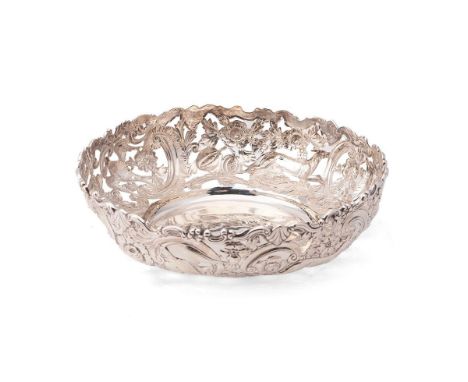 An Irish silver presentation bowl, of pierced, form, with intricately detailed chased and repousse hunting scene, with hounds