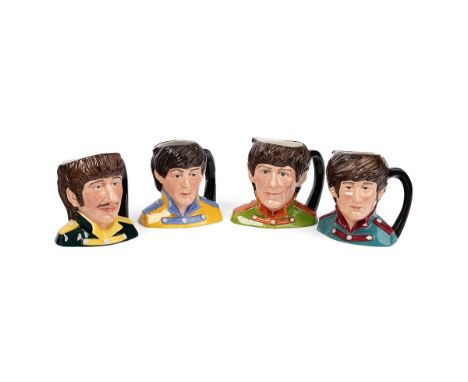 Boxed Royal Doulton set of mid size character jugs The Beatles to include John Lennon D6725, Paul McCartney D6724, Ringo Star