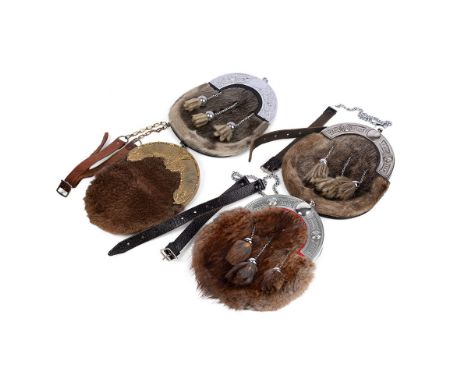 A collection of quality c20th seal &amp; rabbit skin tradition Scottish Highland dress kilt sporrans including a Black Watch 