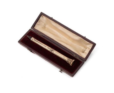 A late Victorian or Edwardian combination propelling pencil and pen, the engine turned body with florette pushers, the foliat