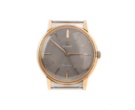 A vintage Omega wristwatch, automatic movement 601 calibre, the black signed, textured dial with baton numerals, in gold plat