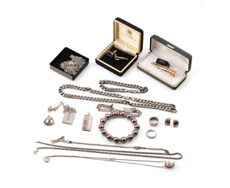 A group of silver and costume jewellery including two silver jubilee ingots, a two tone silver, copper coloured and white sto