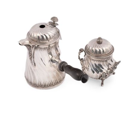 A silver 'Buccellati' chocolate and sugar pot, likely Continental 19th century, the chocolate pot of writhen form with swept 