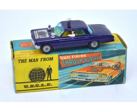 A boxed Corgi ' The Man from U.N.C.L.E. 497 Gun Firing Thrush-Buster', complete with inner folded card, Waverly ring and all 