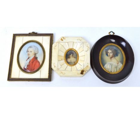 Three 19th century portrait miniatures, one depicting a young Mozart, with two in ivory frames, measurements of largest, 8 x 