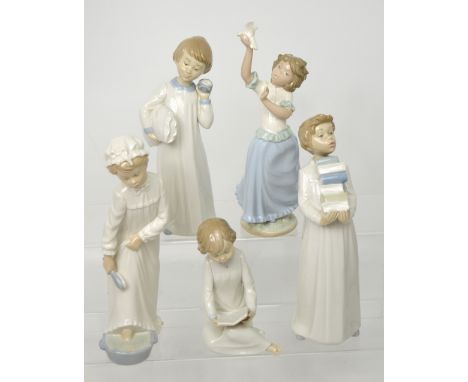 Five various Nao figures depicting young children, the largest example depicting a girl washing her feet, height 28cm (5).