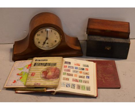A collectors' lot comprising British and world stamps, some in albums and loose, two jewellery boxes and a mahogany Napoleon 