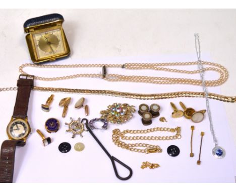 A quantity of costume jewellery to include necklaces, brooches, cufflinks, a gentlemen's wristwatch on leather strap, a Schat