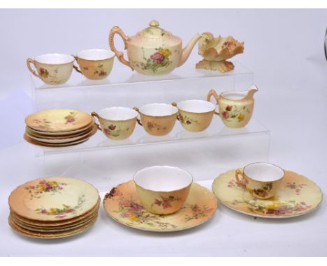 A quantity of Royal Worcester teaware to include six cups and saucers, a teapot, a sugar basin and milk jug, six side plates 