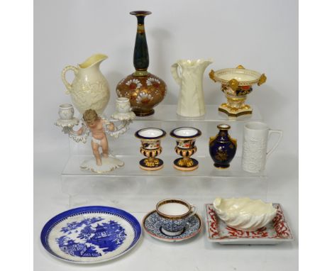 A Doulton Lambeth squat stand vase, a Royal Worcester creamware jug, a Belleek pitcher, a pair of Imari style Davenport urns 