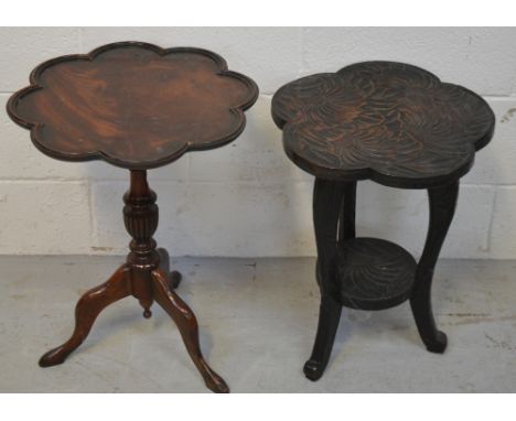 A small walnut floral shaped side table on central carved trefoil support and an Oriental hardwood side table with carved top