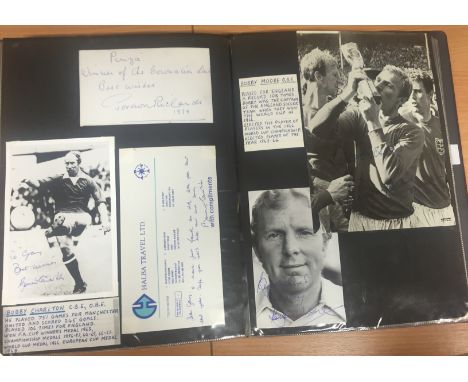 An album of autographs and signed photographs, nearly all relating to stars of sport including Roger Bannister, Jane Torvill 