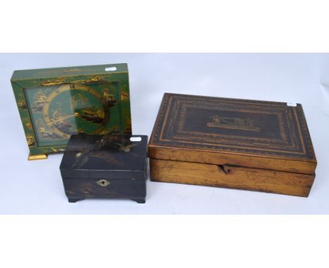 A 1930s chinoiserie decorated electric mantel clock, glazed with gilt detail, an Oriental lacquered fitted jewellery casket a