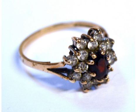 A yellow metal red and white stone cluster ring, marks rubbed, size N, approx 2.1g.