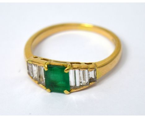 An 18ct yellow gold emerald and diamond ring, size Q, approx 3.5g.