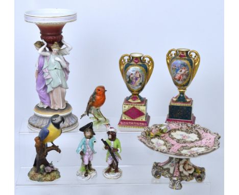 A quantity of 19th and 20th century ceramics to include a figural table centre with figures of the three graces, blue pitch f