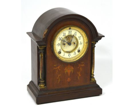 An Edwardian 'Ansonia of New York USA' mahogany and inlaid eight day mantel clock, the enamel dial set with Arabic numerals, 